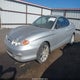 KMHJG25F21U252699 2001 Hyundai Tiburon Base Pkg 1 2 auction photo thumbnail 2