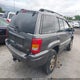 1J8GW68J33C537339 2003 Jeep Grand Cherokee Overland auction photo thumbnail 4