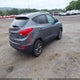 KM8JUCAG9EU825908 2014 Hyundai Tucson Se auction photo thumbnail 4