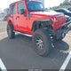 1J4BA3H12AL106576 2010 Jeep Wrangler Unlimited Sport auction photo thumbnail 1