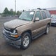 1GNEK13Z74J250116 2004 Chevrolet Tahoe Lt auction photo thumbnail 2