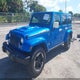 1C4BJWEG4EL212954 2014 Jeep Wrangler Unlimited Polar Edition auction photo thumbnail 2