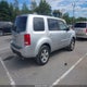 5FNYF4H54AB026760 2010 Honda Pilot Ex-L auction photo thumbnail 4