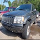 1J8GW68J43C620200 2003 Jeep Grand Cherokee Overland auction photo thumbnail 6