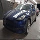 7SAYGDEE1PF592002 2023 Tesla Model Y Awd/Long Range Dual Motor All-Wheel Drive auction photo thumbnail 2