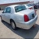 1LNHM81WXYY831135 2000 Lincoln Town Car Executive auction photo thumbnail 3