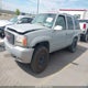 1GKEK13R3XR918836 1999 GMC Yukon Denali auction photo thumbnail 2