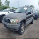 1J4GW58NXXC736618 1999 Jeep Grand Cherokee Laredo auction photo thumbnail 2