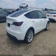 7SAYGDEE8PA150850 2023 Tesla Model Y Awd/Long Range Dual Motor All-Wheel Drive auction photo thumbnail 4