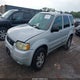 1FMCU94173KB76668 2003 Ford Escape Limited auction photo thumbnail 2