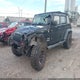 1C4BJWDG1CL243190 2012 Jeep Wrangler Unlimited Sport auction photo thumbnail 2