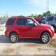 4M2CN8BG1AKJ13334 2010 Mercury Mariner auction photo thumbnail 13