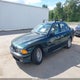 WBADM6348YGU15509 2000 BMW 528Ia auction photo thumbnail 6