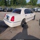 1LNHM83W6YY838127 2000 Lincoln Town Car Cartier auction photo thumbnail 4