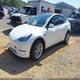 7SAYGDEE4PA083826 2023 Tesla Model Y Awd/Long Range Dual Motor All-Wheel Drive auction photo thumbnail 2