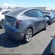 7SAYGDEE5PF865572 2023 Tesla Model Y Awd/Long Range Dual Motor All-Wheel Drive auction photo thumbnail 4