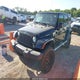 1C4BJWEG7EL142432 2014 Jeep Wrangler Unlimited Sahara auction photo thumbnail 2