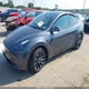 7SAYGDEFXPF711562 2023 Tesla Model Y Performance Dual Motor All-Wheel Drive auction photo thumbnail 2