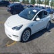 5YJ3E1EAXMF870304 2021 Tesla Model 3 Standard Range Plus Rear-Wheel Drive auction photo thumbnail 2