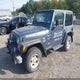 1J4FA49S01P329609 2001 Jeep Wrangler Sport auction photo thumbnail 2