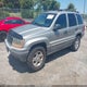 1J4GW48S5YC333521 2000 Jeep Grand Cherokee Laredo auction photo thumbnail 2
