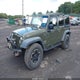 1C4BJWDGXGL106805 2016 Jeep Wrangler Unlimited Sport auction photo thumbnail 2