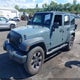 1C4BJWDG3EL201848 2014 Jeep Wrangler Unlimited Sport auction photo thumbnail 2