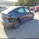 5YJ3E1EA4PF569743 2023 Tesla Model 3 Rear-Wheel Drive auction photo thumbnail 4