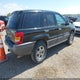 1J4GW48N0YC122463 2000 Jeep Grand Cherokee Laredo auction photo thumbnail 4