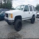 1GKEK13R6VJ703527 1997 GMC Yukon Sle auction photo thumbnail 2