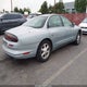 1G3GR62C3S4126069 1995 Oldsmobile Aurora auction photo thumbnail 4