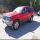 1J4GW48S21C552104 2001 Jeep Grand Cherokee Laredo auction photo thumbnail 2