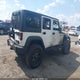 1C4HJWDG4EL159166 2014 Jeep Wrangler Unlimited Sport auction photo thumbnail 4