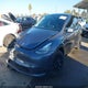 7SAYGDEE9PA112818 2023 Tesla Model Y Awd/Long Range Dual Motor All-Wheel Drive auction photo thumbnail 2