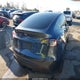 7SAYGDEE9PA112818 2023 Tesla Model Y Awd/Long Range Dual Motor All-Wheel Drive auction photo thumbnail 4