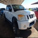 1N6AA0EC0AN323759 2010 Nissan Titan Pro-4X auction photo thumbnail 1