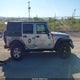 1C4BJWDG1FL560018 2015 Jeep Wrangler Unlimited Sport auction photo thumbnail 14