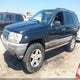 1J4GW48S4YC207361 2000 Jeep Grand Cherokee Laredo auction photo thumbnail 2
