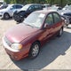 KNAFB121625140900 2002 Kia Spectra Ls auction photo thumbnail 2