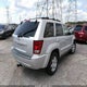 1J4PS4GK7AC117768 2010 Jeep Grand Cherokee Laredo auction photo thumbnail 4