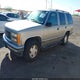1GKEK13R0XJ720388 1999 GMC Yukon Sle auction photo thumbnail 2