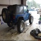 1J4AA2D1XAL154936 2010 Jeep Wrangler Sport auction photo thumbnail 4