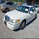1LNHM82W2XY684385 1999 Lincoln Town Car Signature auction photo thumbnail 2