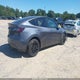7SAYGAEE9PF971859 2023 Tesla Model Y Awd/Long Range Dual Motor All-Wheel Drive auction photo thumbnail 4