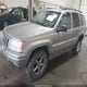 1J8GW68J62C107903 2002 Jeep Grand Cherokee Overland auction photo thumbnail 2
