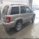 1J8GW68J62C107903 2002 Jeep Grand Cherokee Overland auction photo thumbnail 4