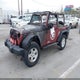 1J4AA2D11AL118231 2010 Jeep Wrangler Sport auction photo thumbnail 2