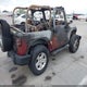 1J4AA2D11AL118231 2010 Jeep Wrangler Sport auction photo thumbnail 4