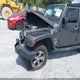 1C4HJWEG5GL201734 2016 Jeep Wrangler Unlimited Sahara auction photo thumbnail 6