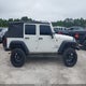 1J4BA3H11AL125443 2010 Jeep Wrangler Unlimited Sport auction photo thumbnail 13